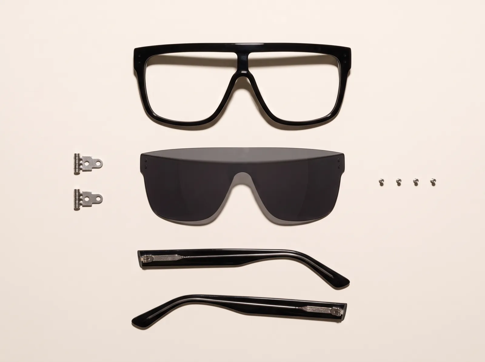 Vanta disassembled: acetate front, shield lens, hinges, temples and screws